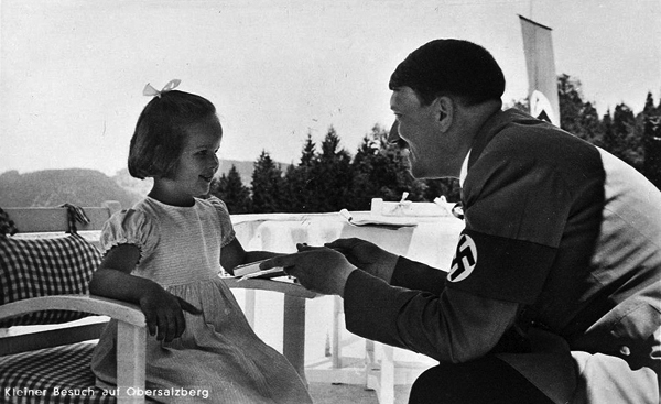 Adolf Hitler with a little girl on the terrace of Haus Wachenfeld